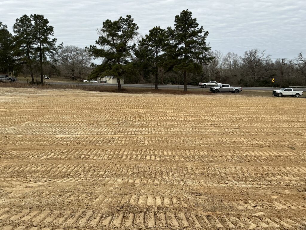 Dirt work services leveling land for construction